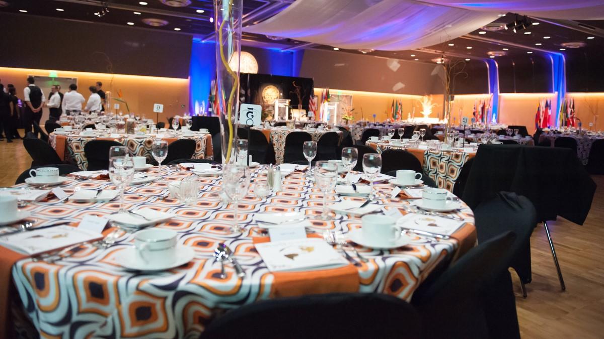 Empty Tables prepared for a banquet in the International Ballroom